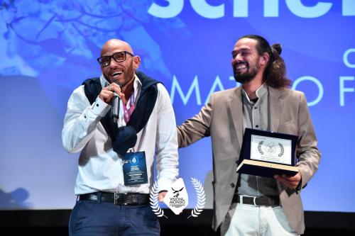 Matteo Faccenda, regista di “Riflesso sullo schermo” e Stefano Simonelli, protagonista, vincitore del Premio Visioni Dal Mondo 2021 Miglior Lungometraggio Italiano